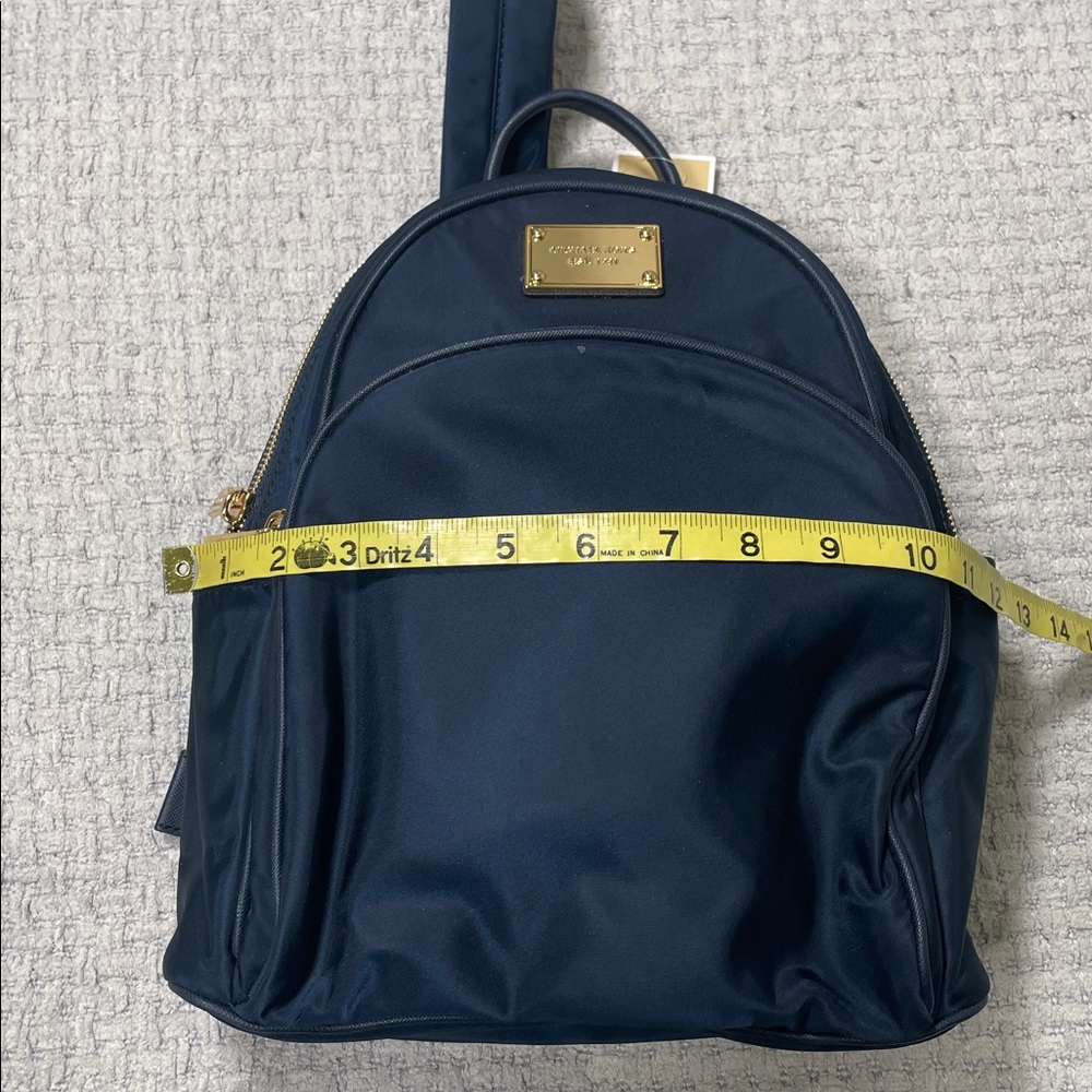 NWT’s Micheal Kors Jet Set Navy Blue Gold Backpack Bag Travel Pockets - Picture 11 of 16